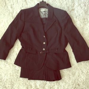Skirt and belted jacket suit